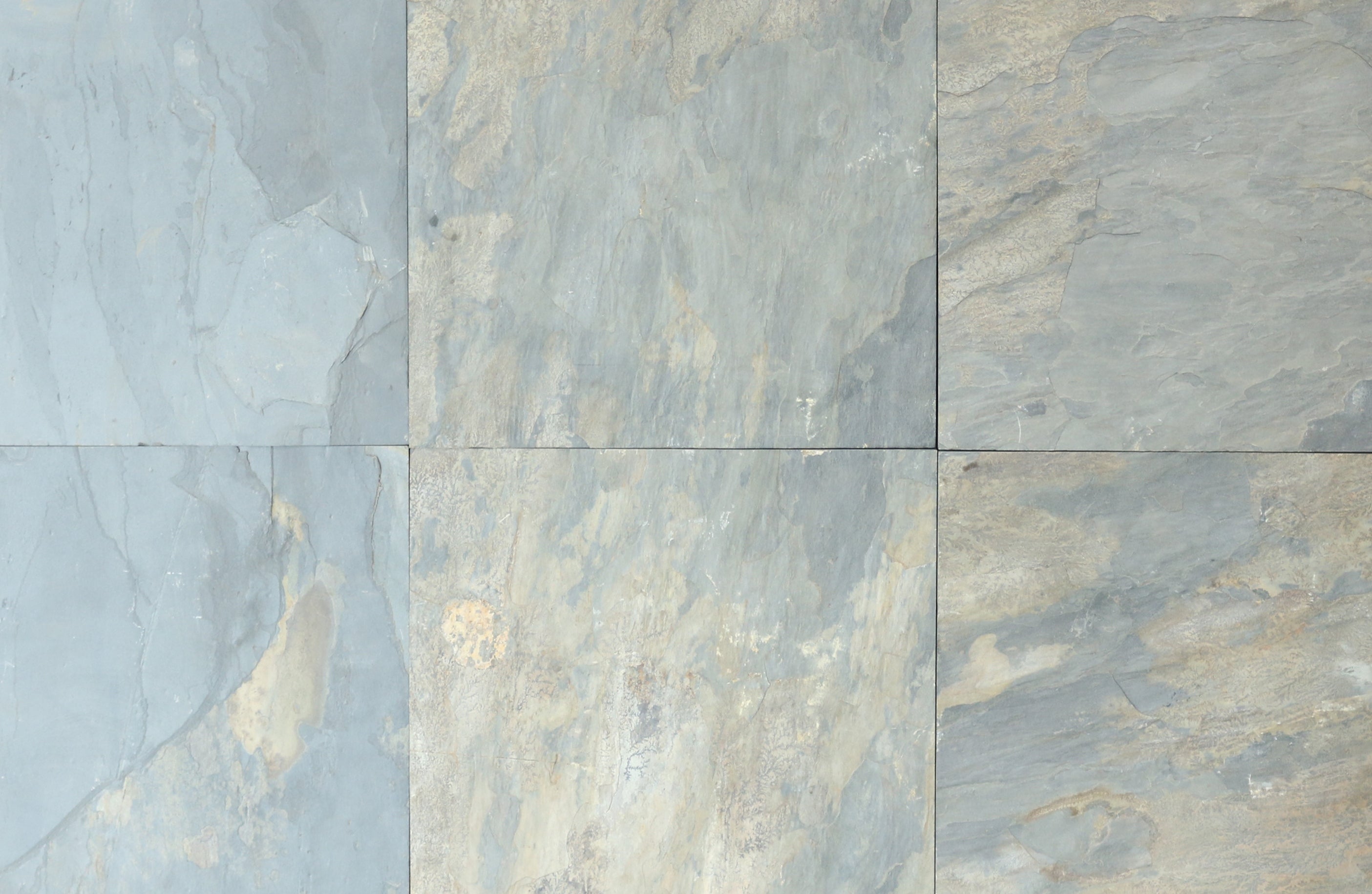 Gray slate tiles with natural texture and subtle color variations.