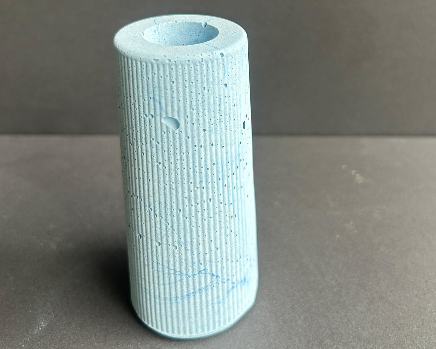 Concrete cylindrical ribbed texture blue vase