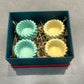 Diwali Hampers candle holders in a concrete