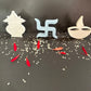Decorative items including a Kalash, swastika symbol, 