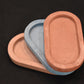 Concrete Three oval trays in different colors 