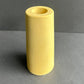 Yellow ribbed concrete cylindrical vase
