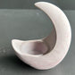 Ceramic crescent moon-shaped candle holder