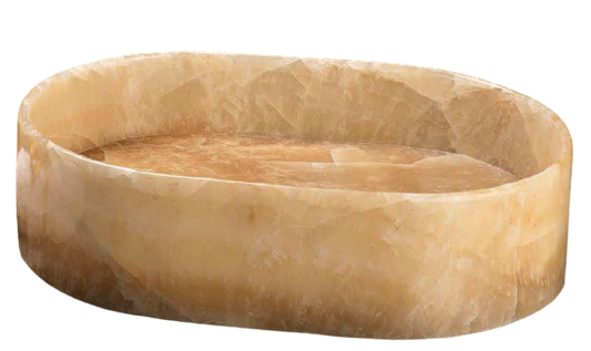 An oval-shaped stone basin with a smooth, flat base, presented in a beige to light brown gradient, likely made from natural stone material